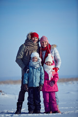 Fototapeta na wymiar Family in winterwear