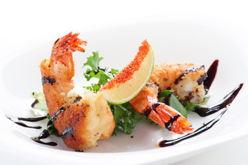 Deep fried shrimps on white plate