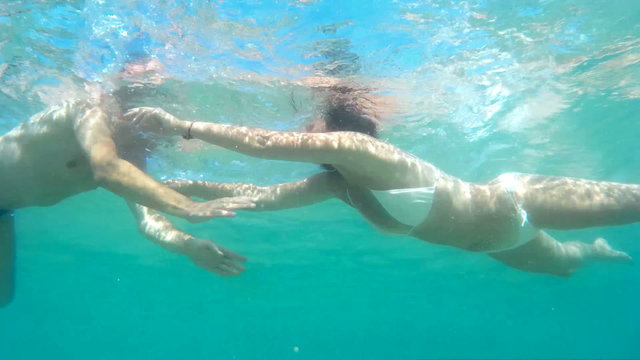 Underwater kiss