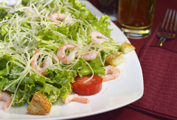 Appetizer salad with shrimps, restaurant dish