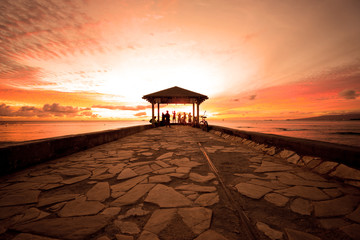 Waikiki cement pier at sunset