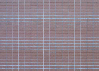 Brown brick tile wall background and texture