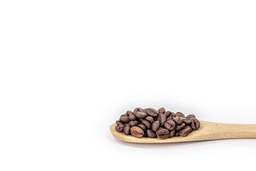 Obraz premium wooden spoon of coffee bean