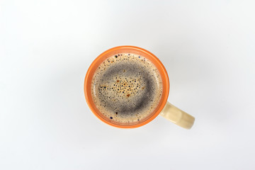 orange mug of coffee? isolated top view