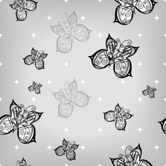 Seamless pattern of hand-drawn butterflies on grey background