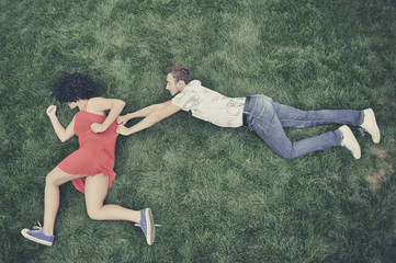 Boy and girl in the grass
