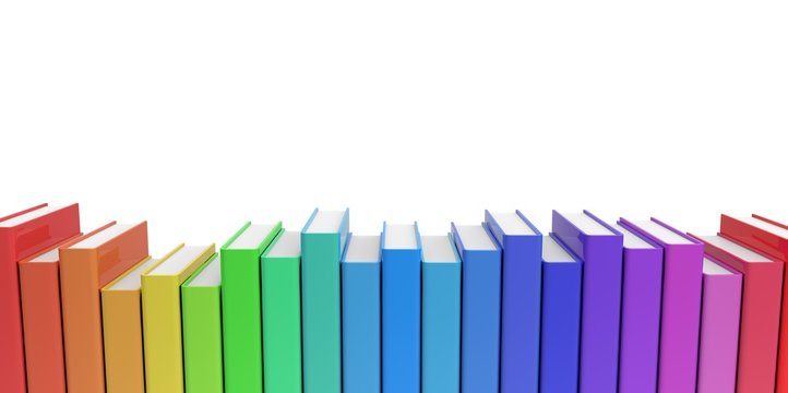 Row stack of colorful books on a plain background