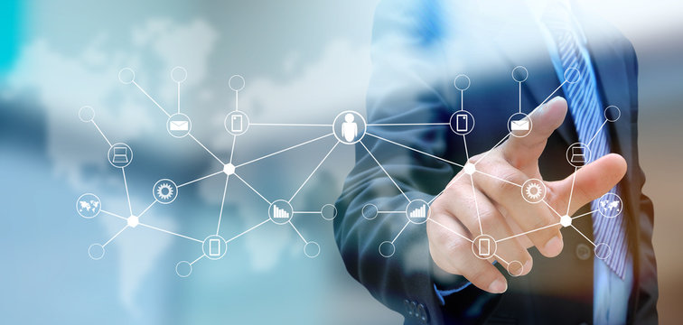 hand pushing social network button on a touch screen interface