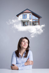 Woman dreaming about new house