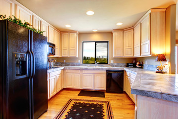Kitchen room with light tone cabinets