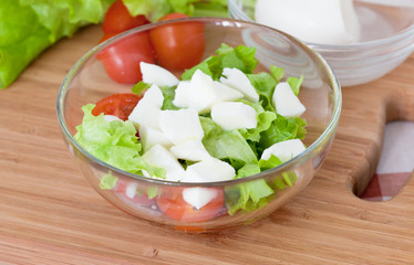  Italian salad from cherry tomatoes, a mozzarella and lettuce