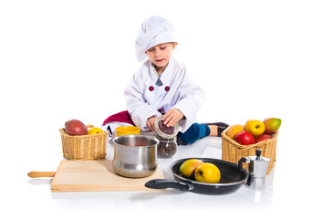 Blonde little girl dressed like chef