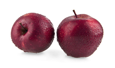 red apple in drops of water