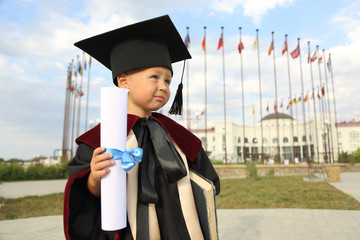 graduate - a little boy - 74185418