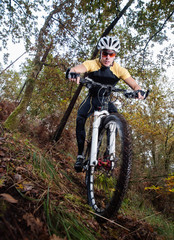 Naklejka premium Cyclist downhill