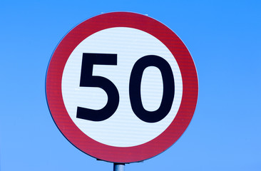 Speed limit 50 kph road sign.