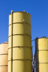three silos yellow