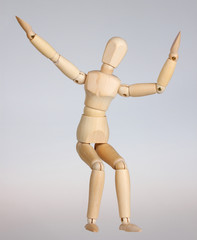 Wooden mannequin happy