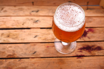 Glass of beer in a crate