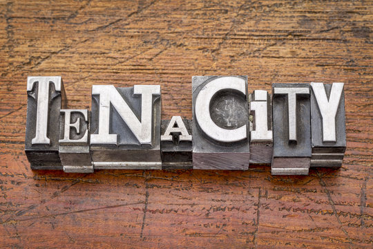 tenacity word in  metal type