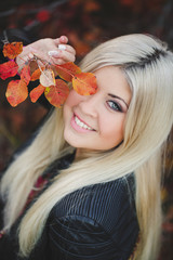 Autumn portrait of a beautiful blonde.