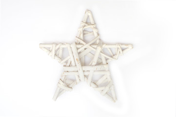 Wicker Christmas star on a white background