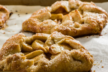 Sugared apple tarts on a tray