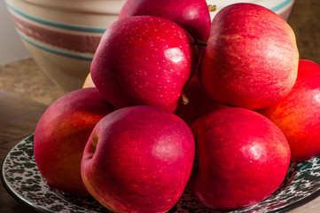 Bowl of freshly picked red apples