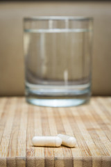 capsules and water