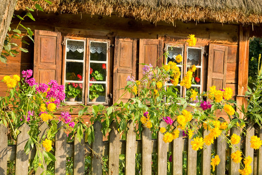 Fototapeta Traditional rural wooden cottage house