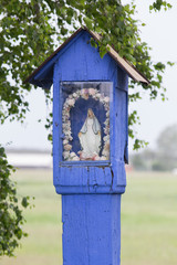 Rural wooden wayside shrine