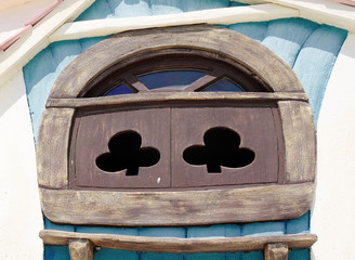 Window of fairy tale house in children's park