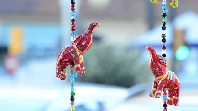 Indian elephants hanging in hawker stall craft