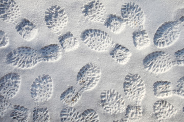 Many shoeprints in fresh snow