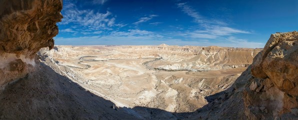 Desert cliffs and river panorama.