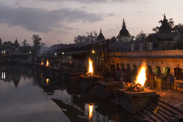 Pashupatinath temple complex on Bagmati River in the evening. Fu