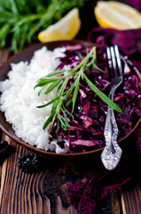 Obraz na płótnie Canvas Salad of red cabbage with a side dish of rice
