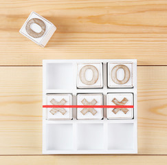 Game of Tic Tac Toe on wooden background