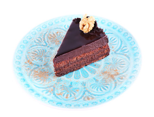 Delicious chocolate cake on plate isolated on white
