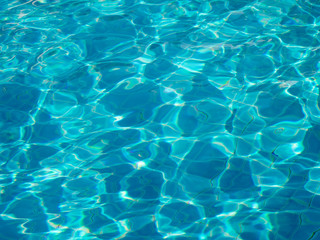Fototapeta na wymiar Shining blue water ripple