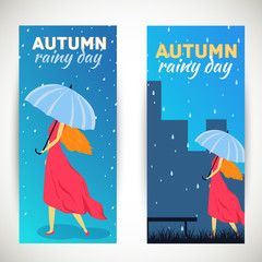 Girl with umbrella in a autumn raining beautiful day vertical ba