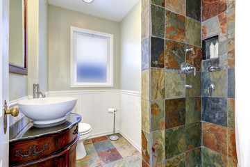 Bathroom interior iwth colorful tile wall trim