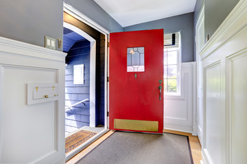 Entrance hallway with open red door