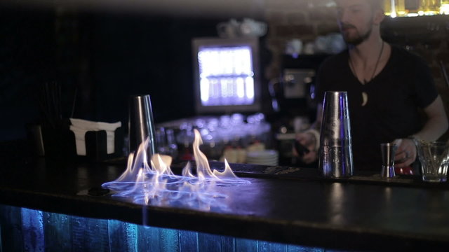 Bartender ignites bar