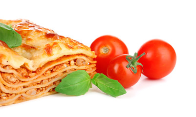 Portion of tasty lasagna, isolated on white