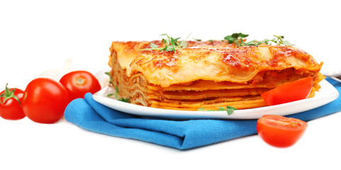 Portion of tasty lasagna, isolated on white