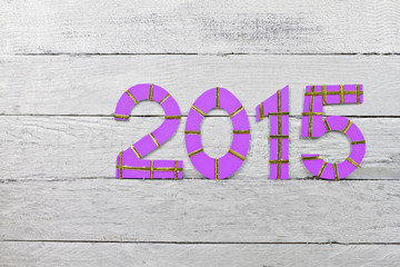 Numbers 2015 on a silver painted clapboard