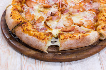 Close up pizza on wood