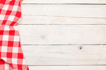 Fototapeta na wymiar Red towel over wooden kitchen table