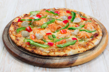 Delicius pizza on wood